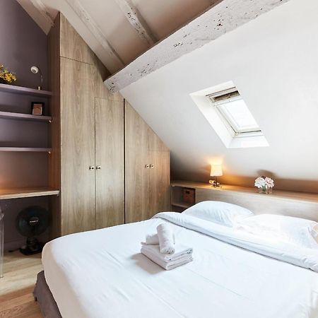 פריז Place Des Vosges - 1Br With Balcony - Cityapartmentstay מראה חיצוני תמונה